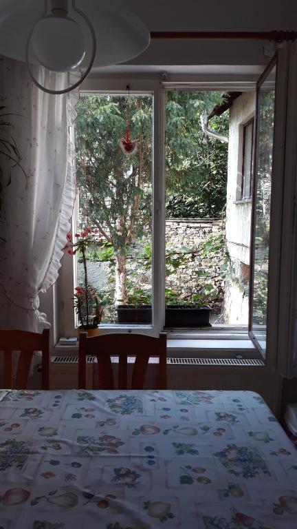 Postel nebo postele na pokoji v ubytování Éva Vendégház