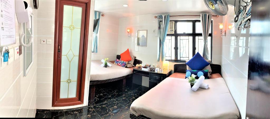 Rúm í herbergi á Cebu Inn