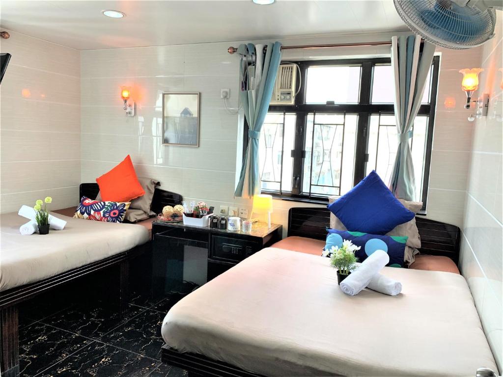 Rúm í herbergi á Cebu Inn