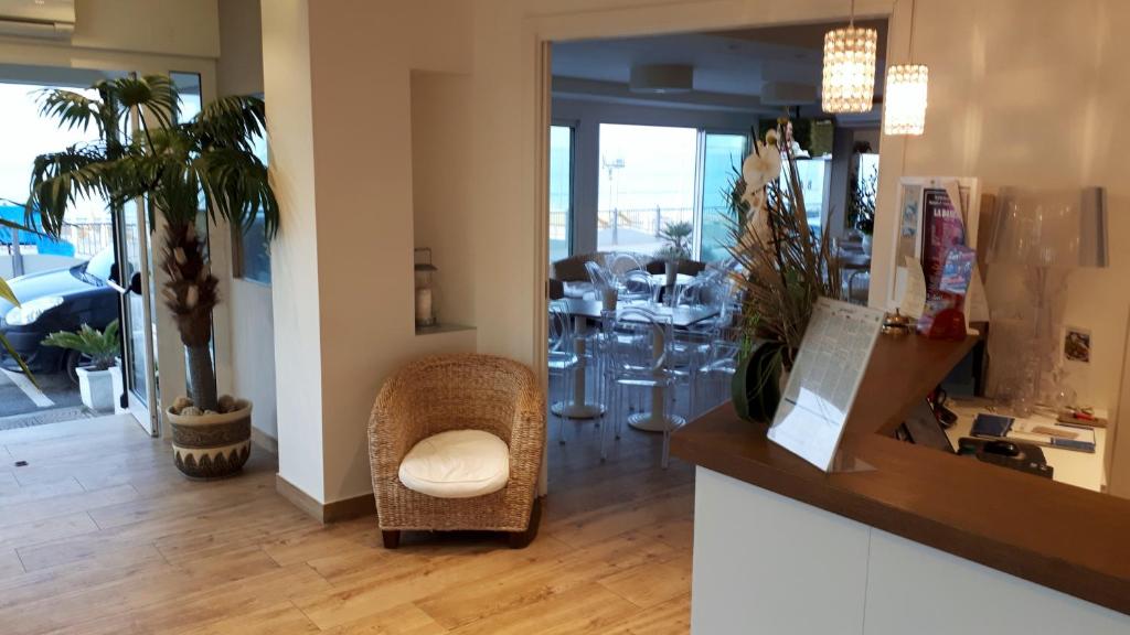 Posezení v ubytování Hotel Oasi Ristorante Pizzeria