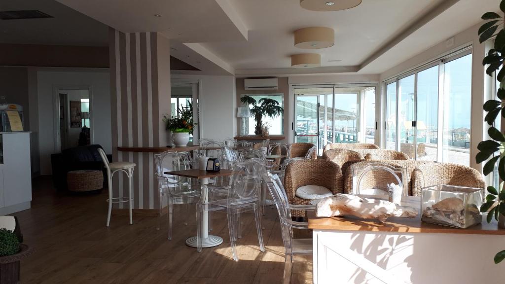 Posezení v ubytování Hotel Oasi Ristorante Pizzeria