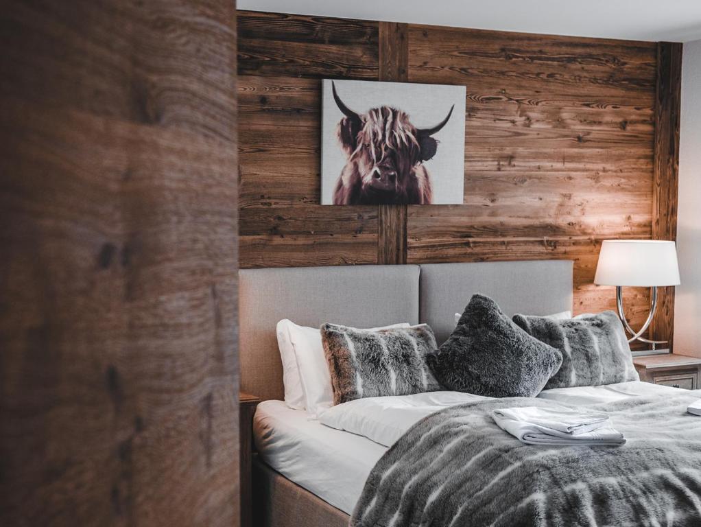 Postel nebo postele na pokoji v ubytování Sonnegg Lodge 2.1