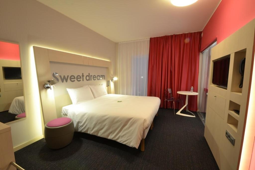 Postel nebo postele na pokoji v ubytování Ibis Styles Nivelles