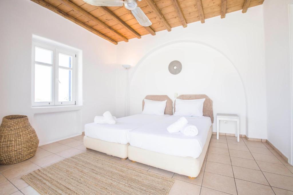 Postel nebo postele na pokoji v ubytování Villa Phoebe
