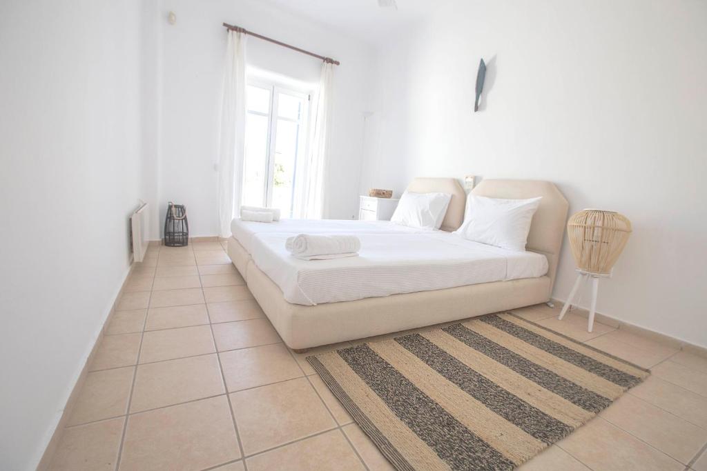Postel nebo postele na pokoji v ubytování Villa Phoebe