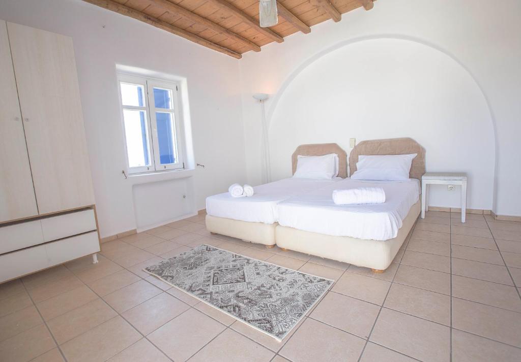 Postel nebo postele na pokoji v ubytování Villa Phoebe