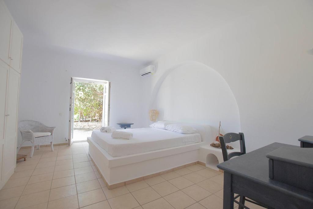 Postel nebo postele na pokoji v ubytování Villa Phoebe