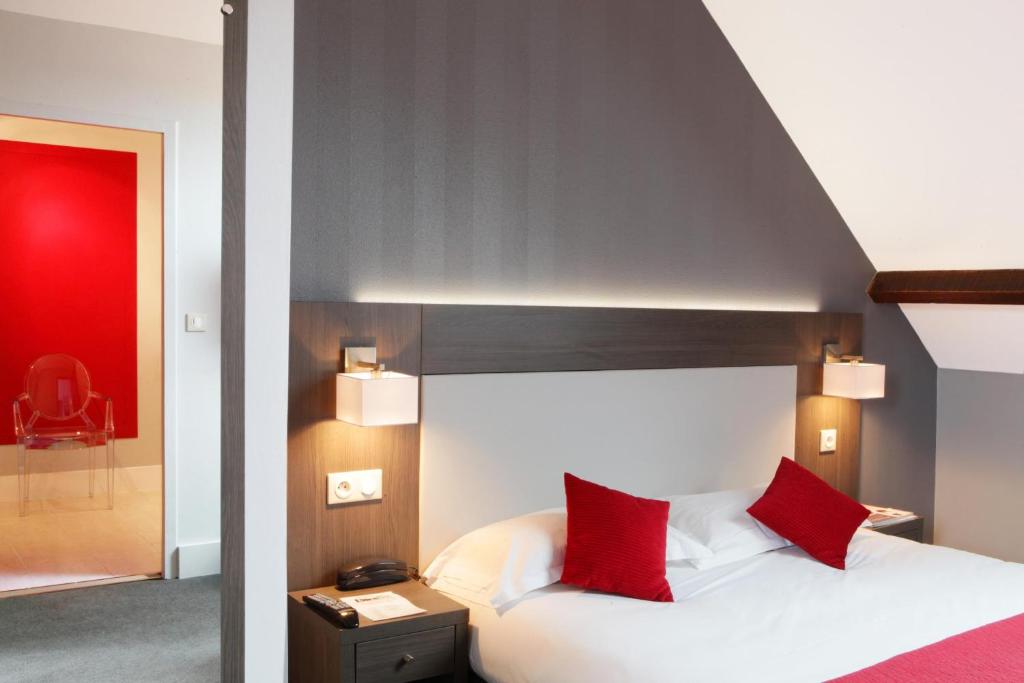 Postel nebo postele na pokoji v ubytování Best Western Plus Hotel Du Parc Chantilly