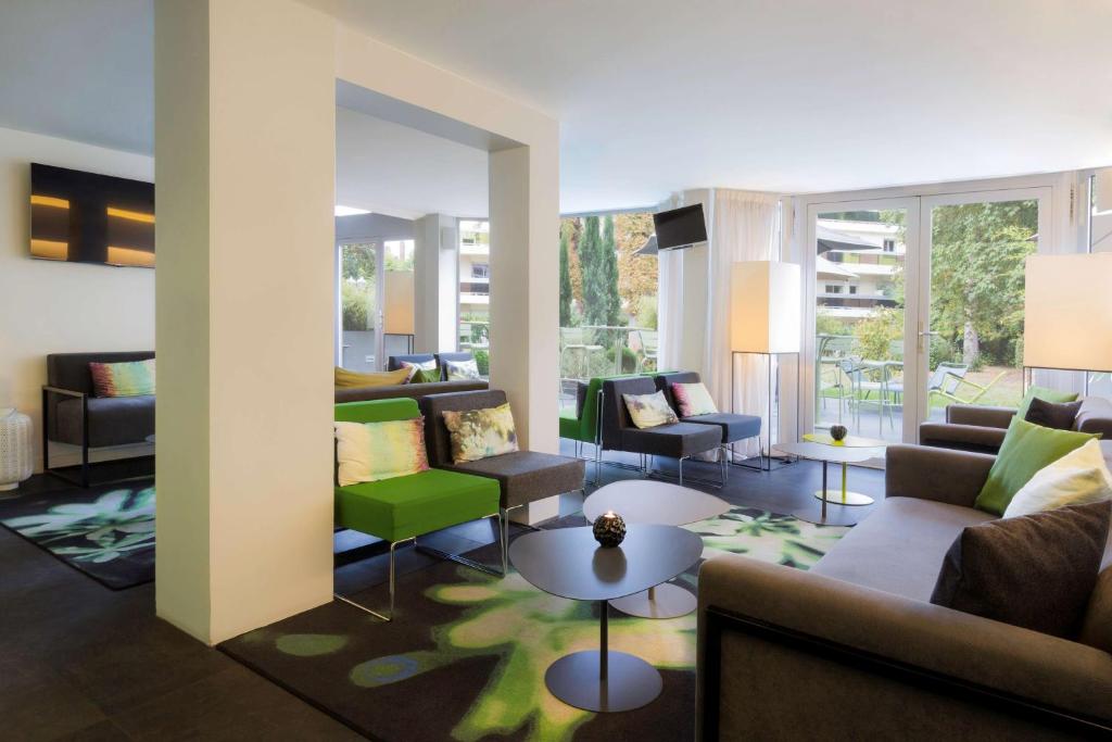 Posezení v ubytování Best Western Plus Hotel Du Parc Chantilly