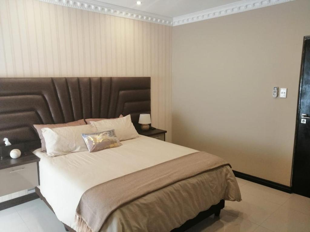 Katil atau katil-katil dalam bilik di Erasmia Palms Boutique Hotel & Spa