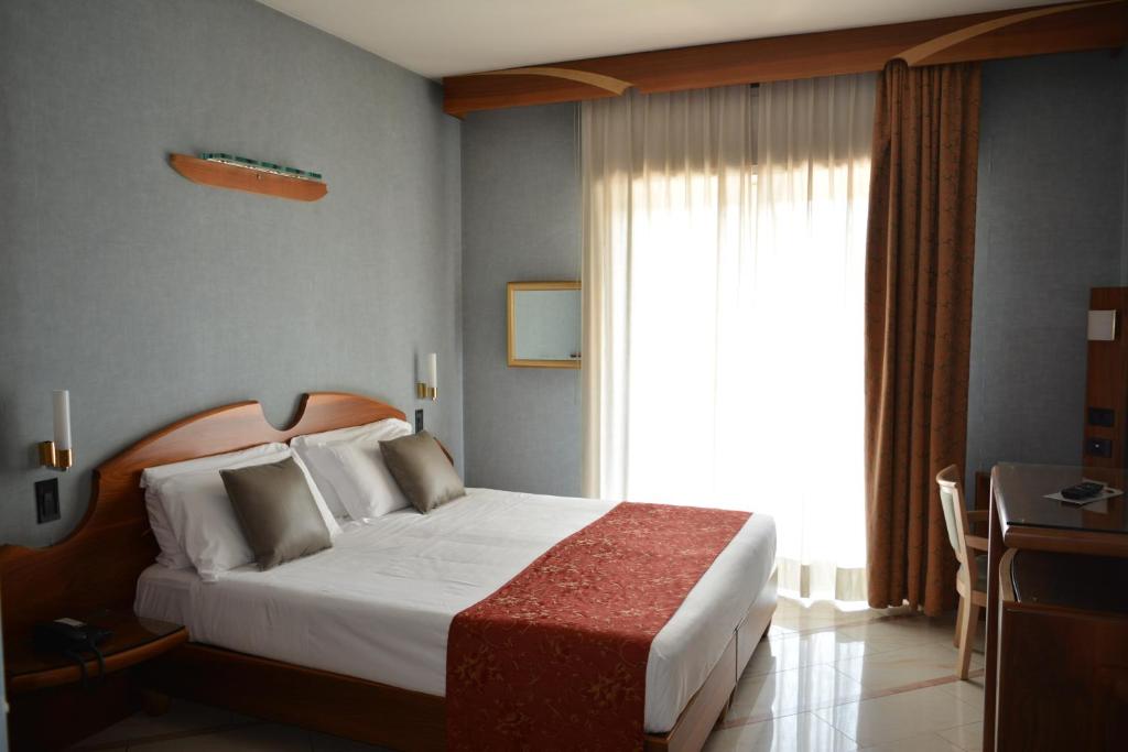 Postel nebo postele na pokoji v ubytování Hotel Sunflower