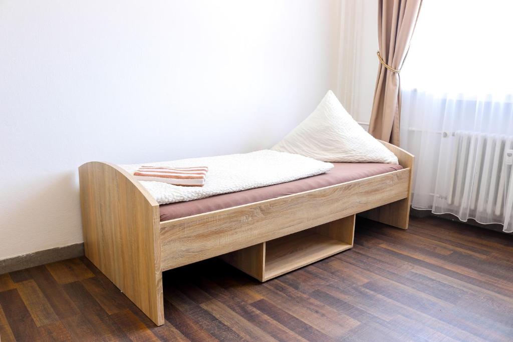 Postel nebo postele na pokoji v ubytování FMM Hostel