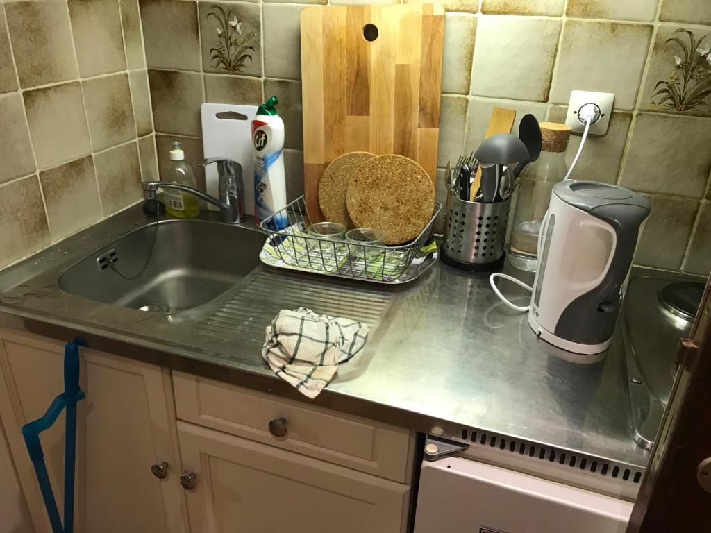 a kitchen counter top with a sink and a counter top at Studio in the center of Saint-Jean-cap-Ferrat in Saint-Jean-Cap-Ferrat