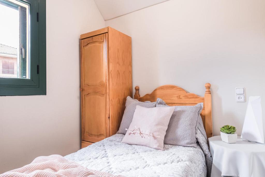 Postel nebo postele na pokoji v ubytování Hostal Buenos Aires