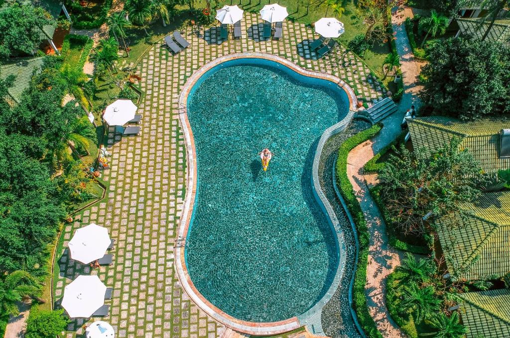 an overhead view of a swimming pool in a resort at Famiana Green Villa in Phu Quoc