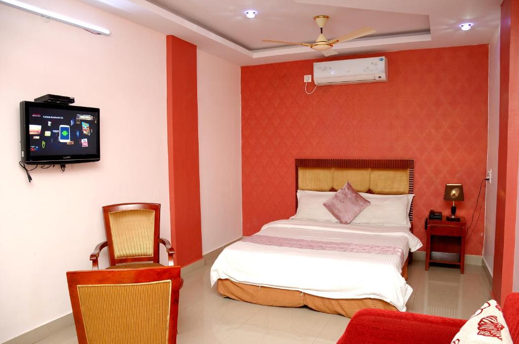 Postel nebo postele na pokoji v ubytování Hotel Kings Kastle