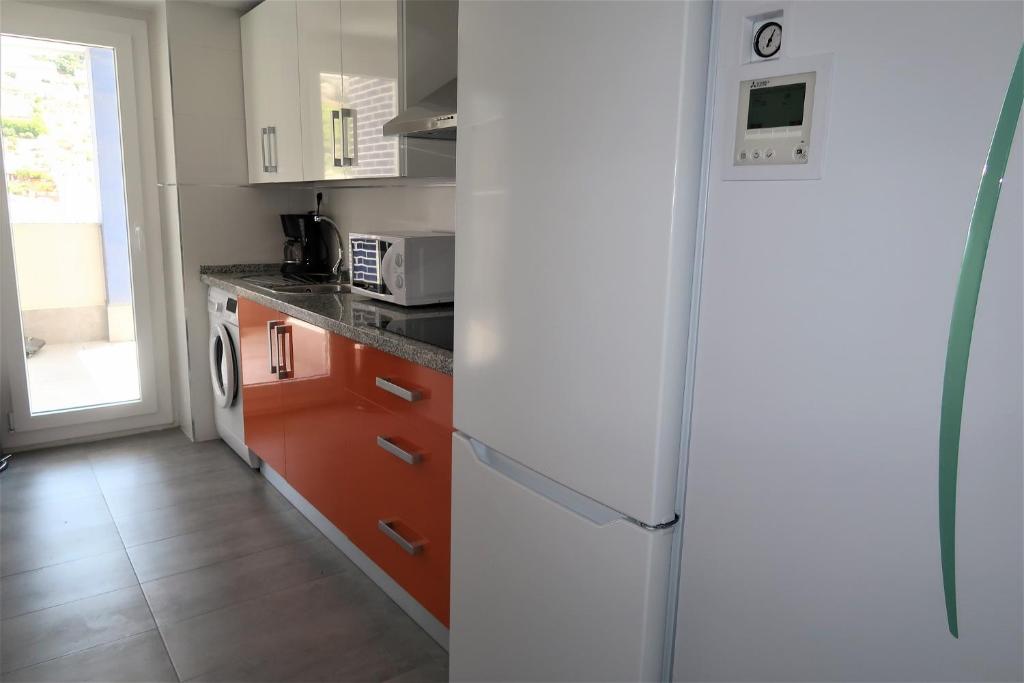 Kuchyňa alebo kuchynka v ubytovaní RESIDENCIAL PLAYA CABRIA