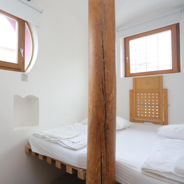 Postel nebo postele na pokoji v ubytování Hostel Celica