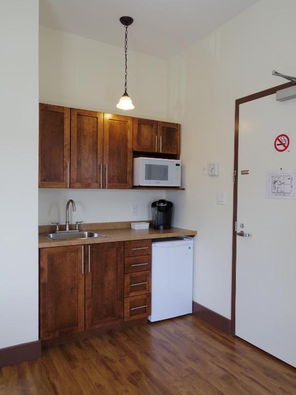 Kuchyň nebo kuchyňský kout v ubytování Water Suites