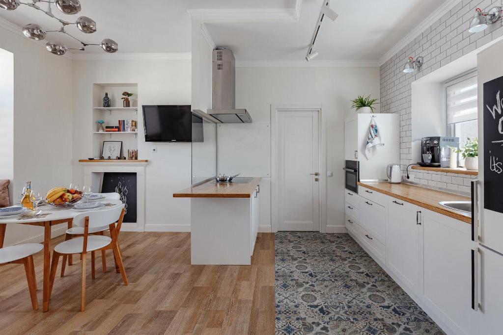 Kuchyň nebo kuchyňský kout v ubytování Scandi Apart Odessa