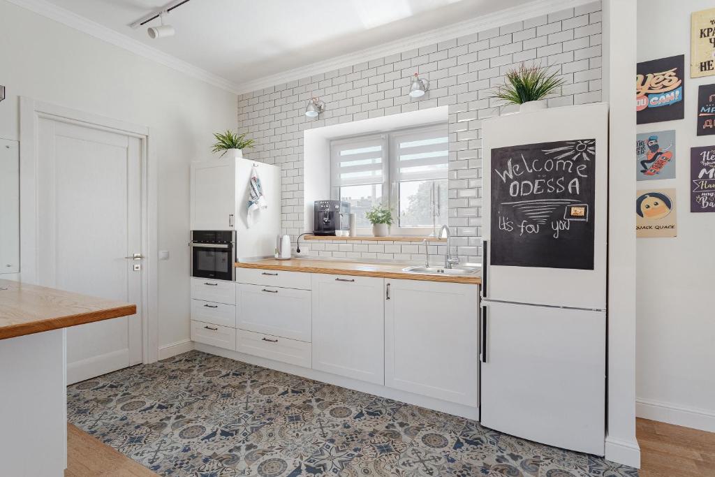 Kuchyň nebo kuchyňský kout v ubytování Scandi Apart Odessa