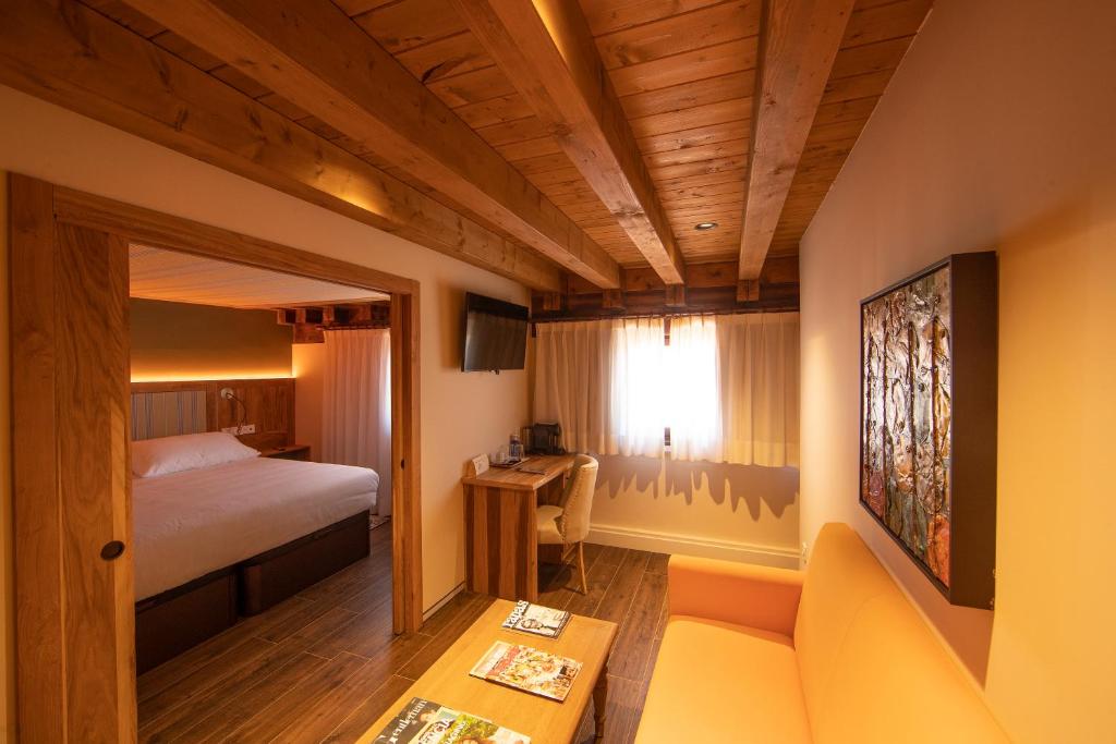 Postel nebo postele na pokoji v ubytování Camarote Hotel