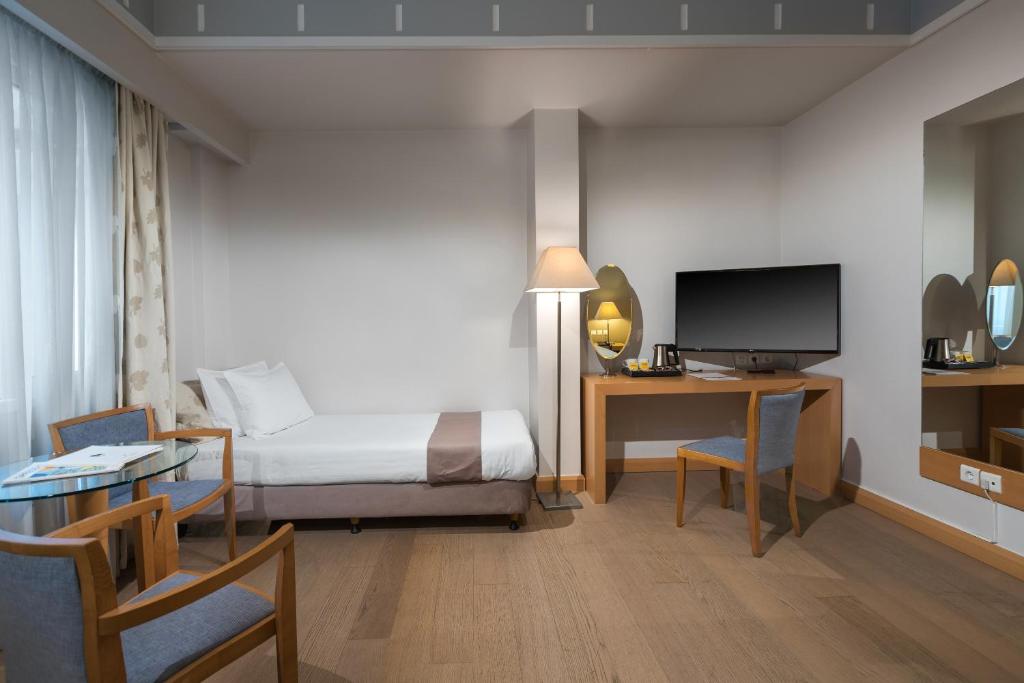 TV a/nebo společenská místnost v ubytování Central Hotel