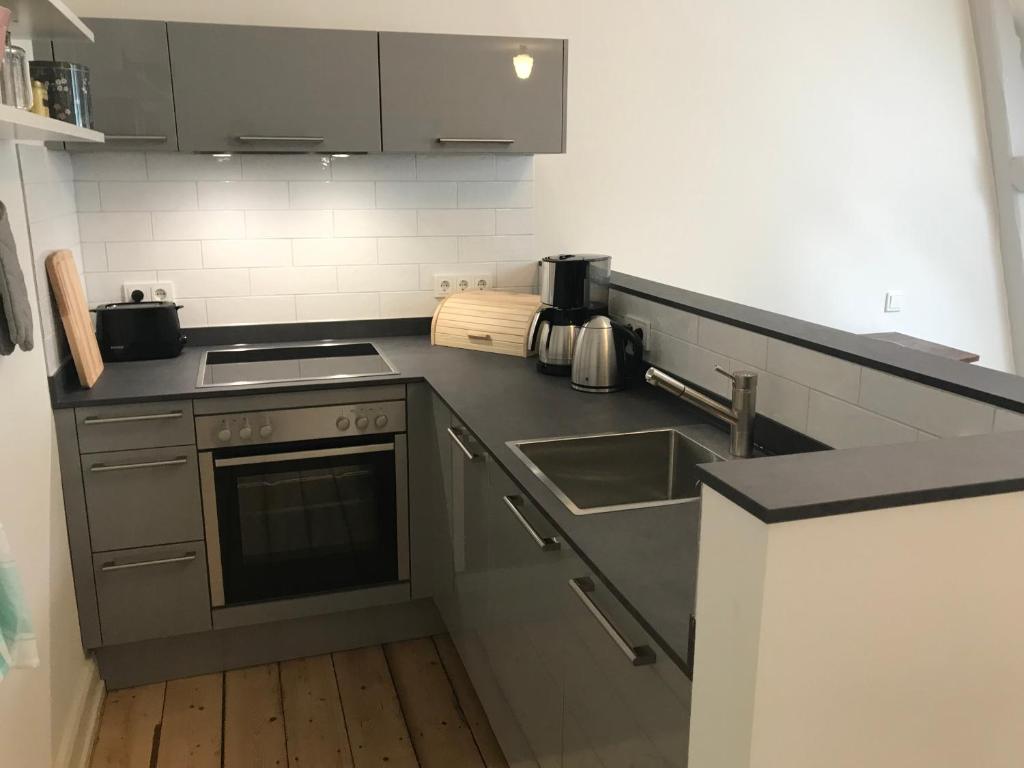 Kuchyň nebo kuchyňský kout v ubytování Villa Friedenstraße 11