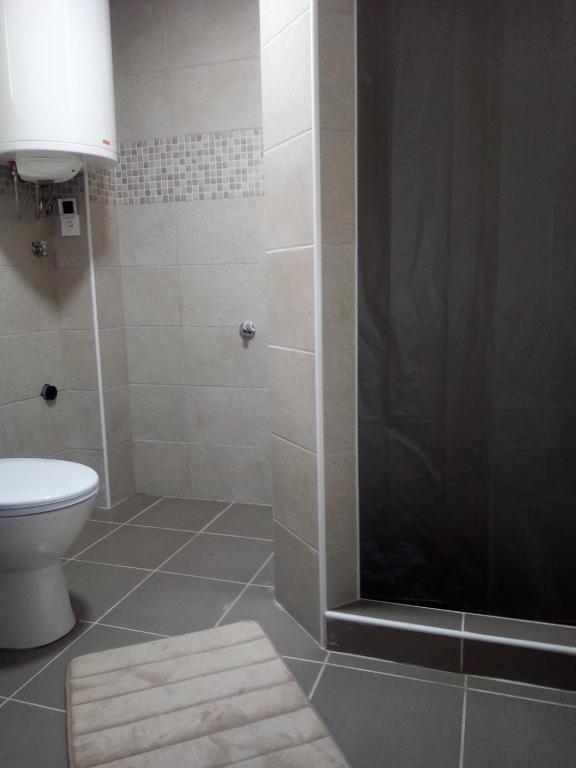 Koupelna v ubytování Apartmani Trio