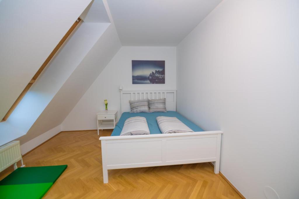Łóżko lub łóżka w pokoju w obiekcie Vienna Hotspot