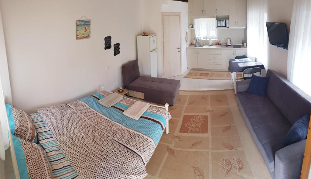 Postel nebo postele na pokoji v ubytování Safe and cozy studio in Xanthi!