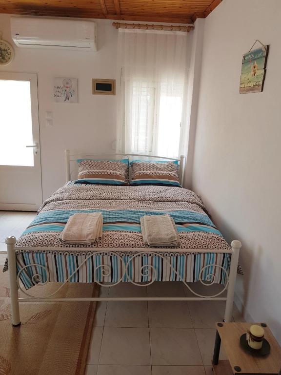 Postel nebo postele na pokoji v ubytování Safe and cozy studio in Xanthi!