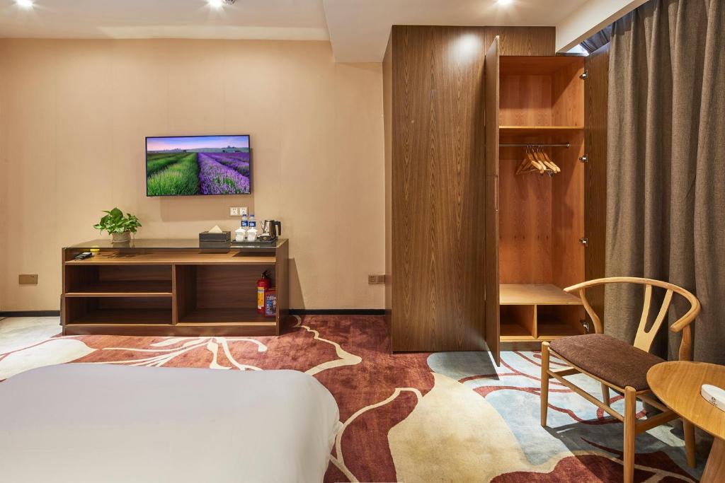 TV a/nebo společenská místnost v ubytování Insail Hotels Railway Station Guangzhou