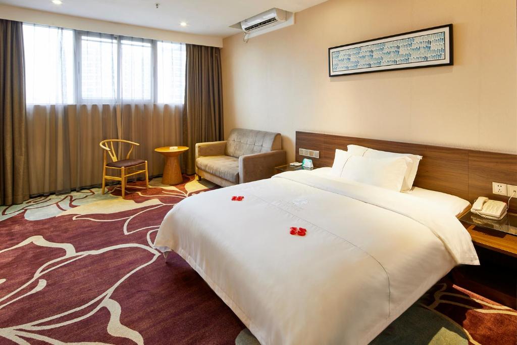 Postel nebo postele na pokoji v ubytování Insail Hotels Railway Station Guangzhou