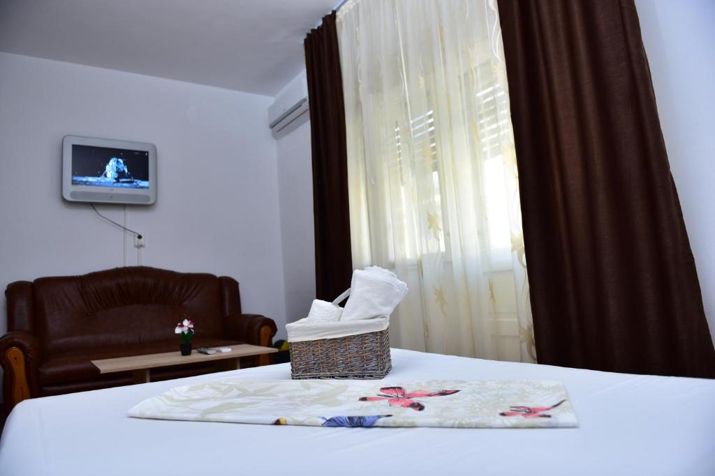 Postel nebo postele na pokoji v ubytování Vila Arjana