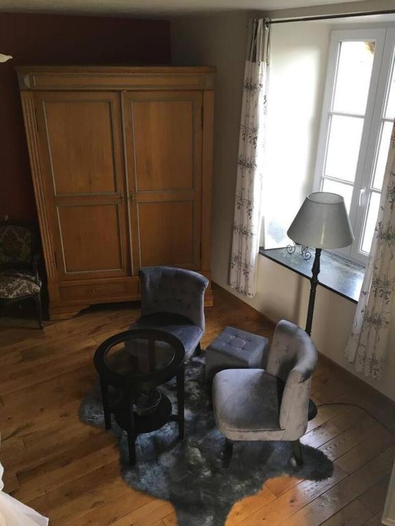 Posezení v ubytování Gîte "L'échappée amoureuse et féérique"