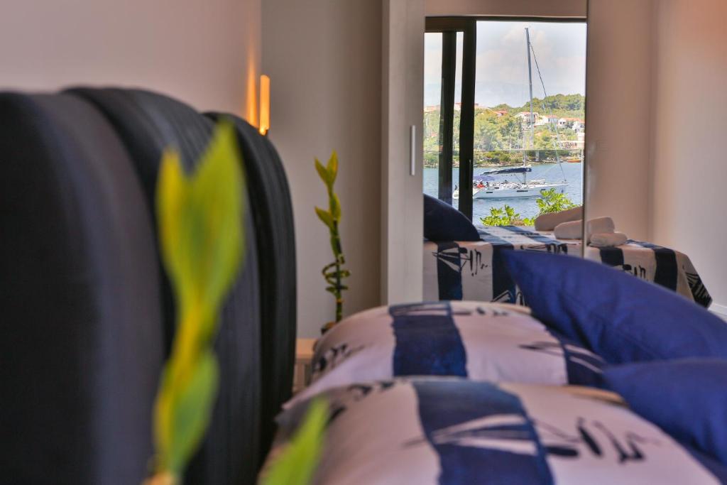Postel nebo postele na pokoji v ubytování Hotel Paradise Punta
