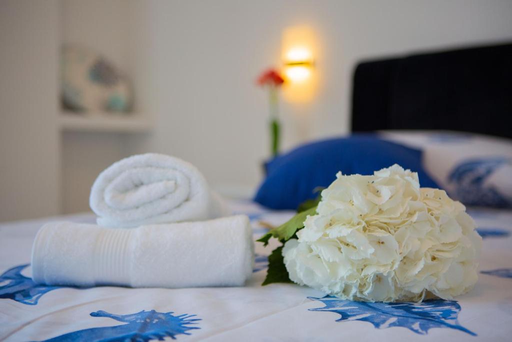 Postel nebo postele na pokoji v ubytování Hotel Paradise Punta