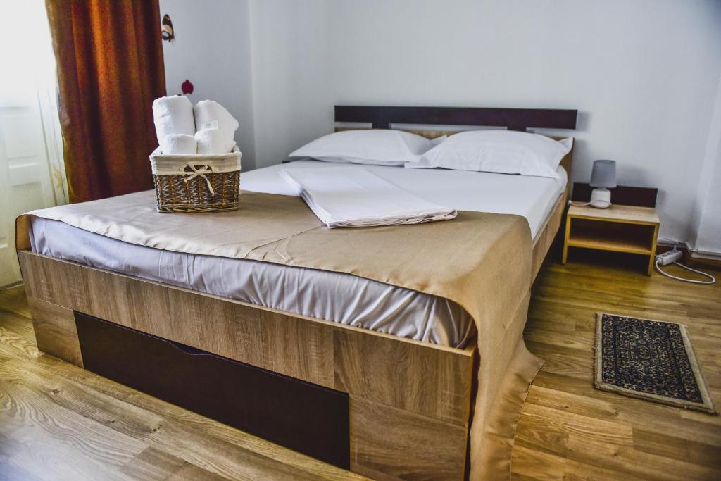 Postel nebo postele na pokoji v ubytování Vila Arjana