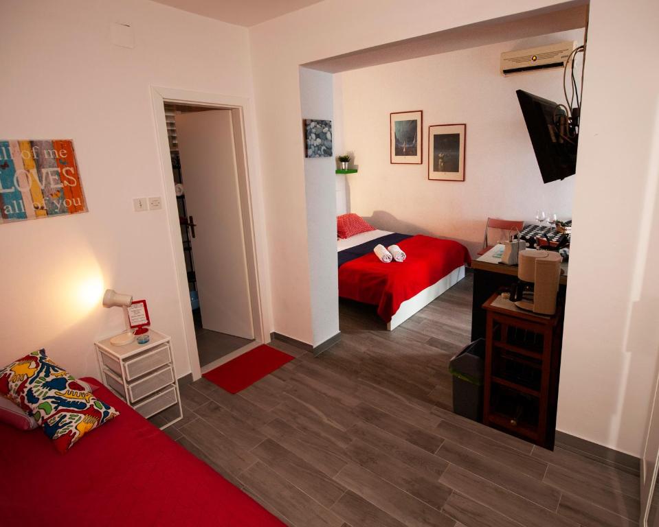 Postel nebo postele na pokoji v ubytování Apartments Barka