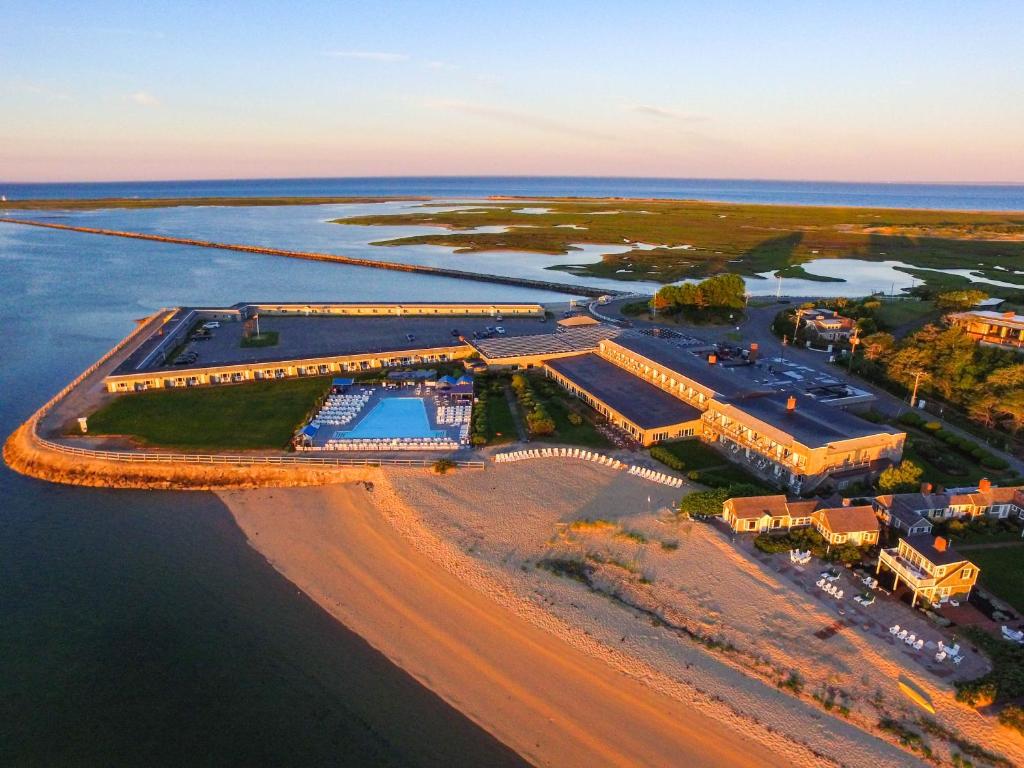 an aerial view of a resort next to the water at Provincetown Inn in Provincetown