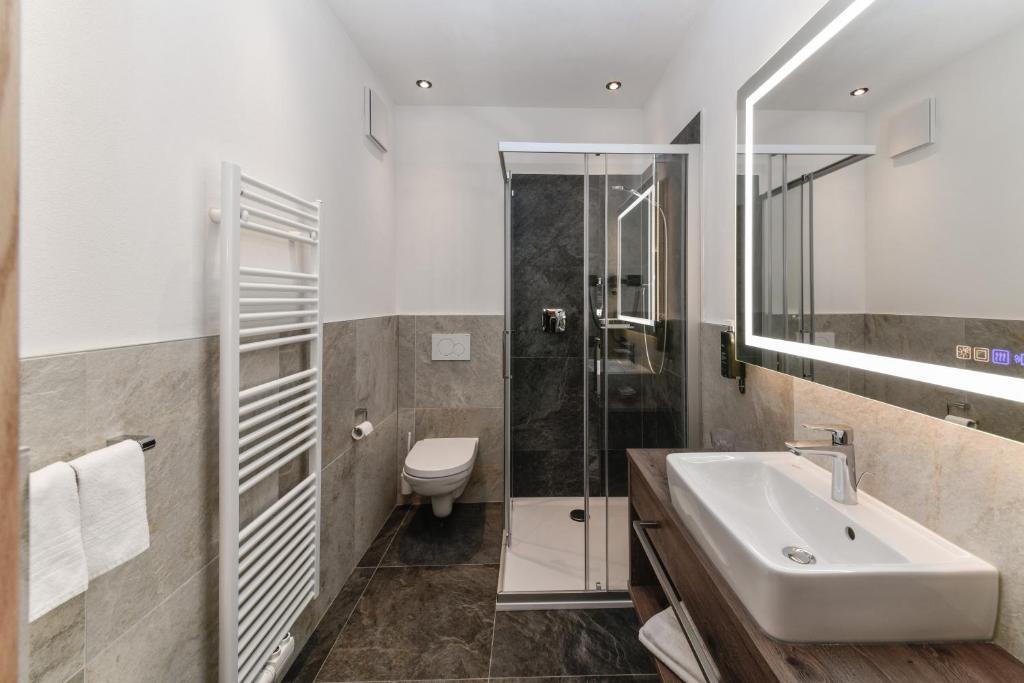 Koupelna v ubytování Hotel Brunella