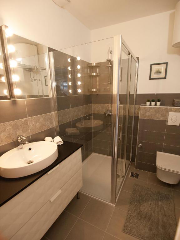 Koupelna v ubytování Apartments Barka
