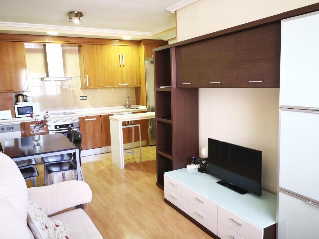 Una cocina o zona de cocina en Apartamentos Cocó