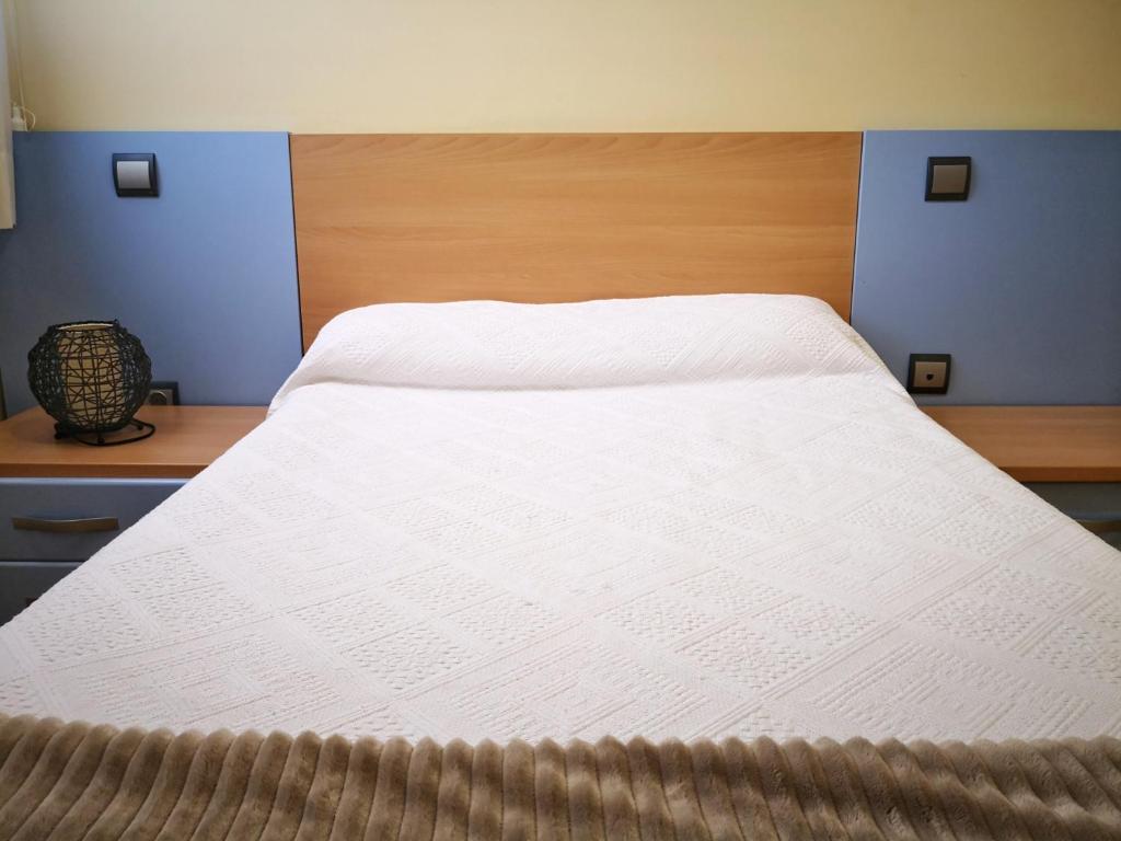 Cama o camas de una habitación en Apartamentos Cocó