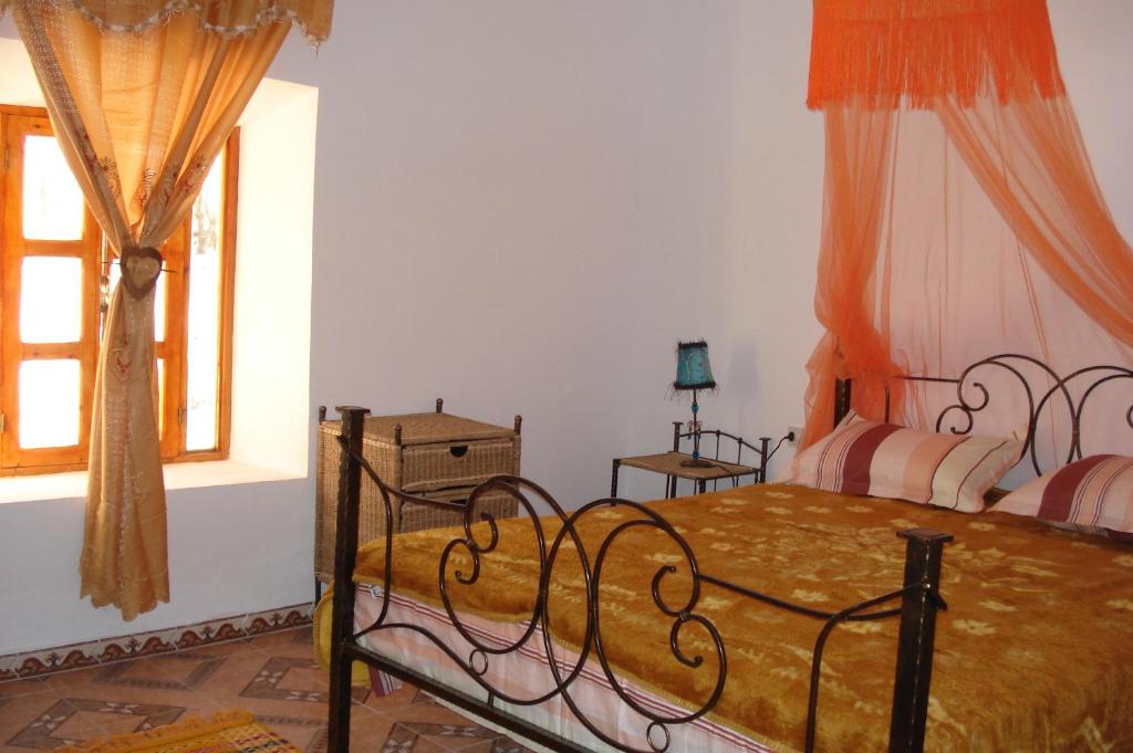 Postel nebo postele na pokoji v ubytování Gîte Imarin