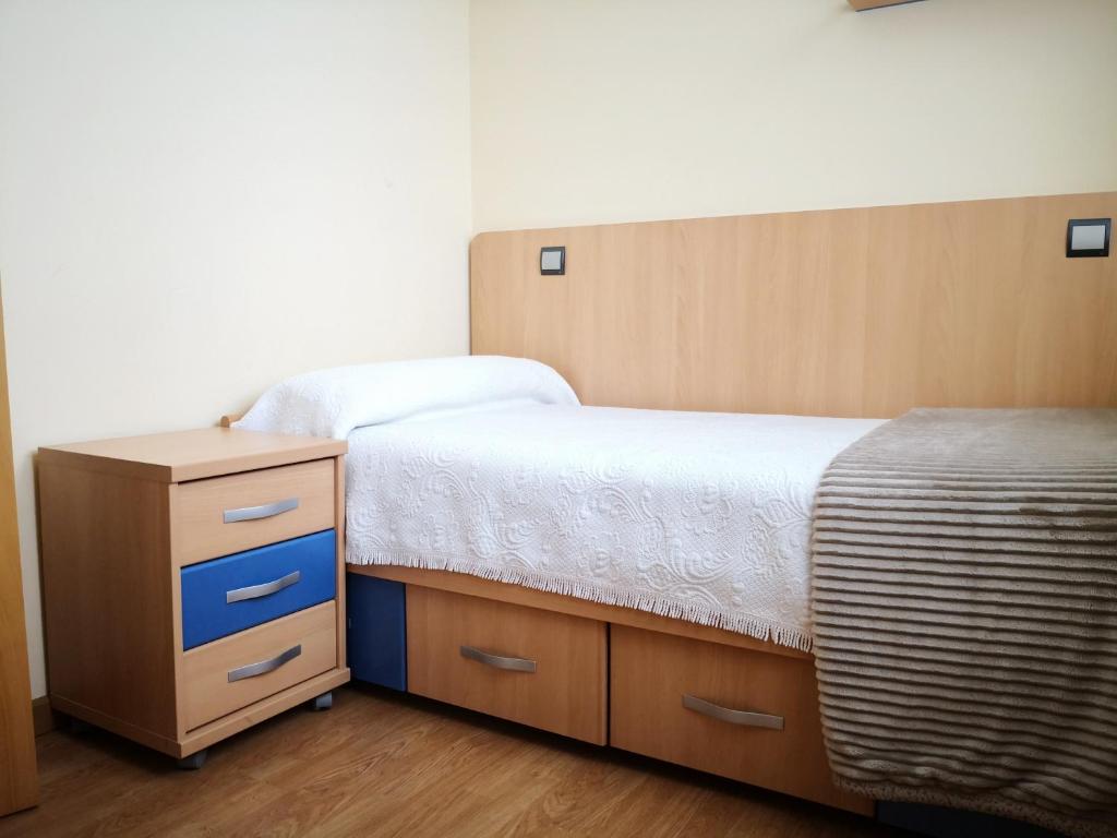 Cama o camas de una habitación en Apartamentos Cocó