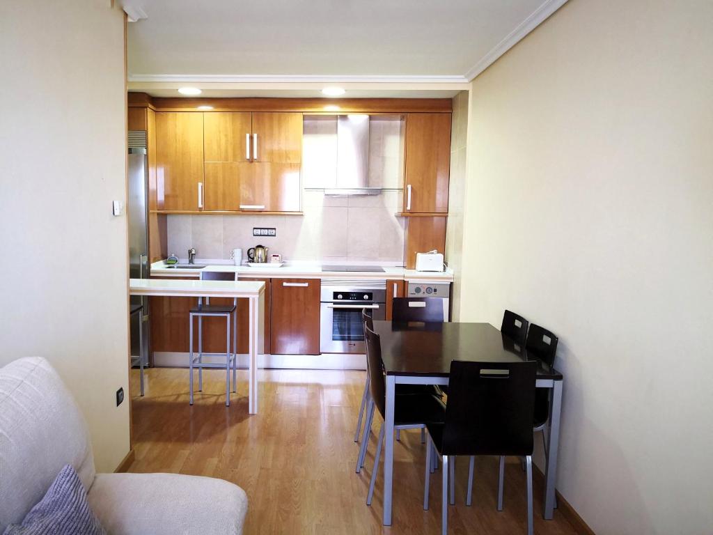 Una cocina o zona de cocina en Apartamentos Cocó