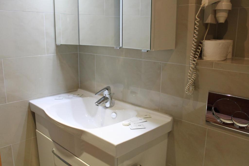 Koupelna v ubytování Hotel Verdi