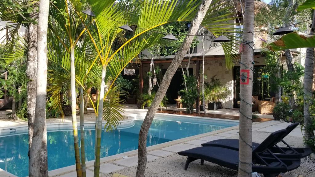 Bazén v ubytování Trece Lunas Tulum - Enchanted Resort nebo v jeho okolí